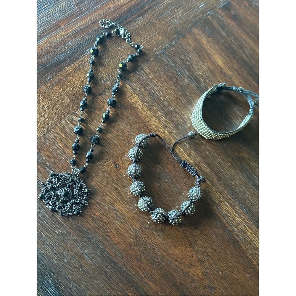 Lia Sophia black beaded pendant necklace with bracelets.